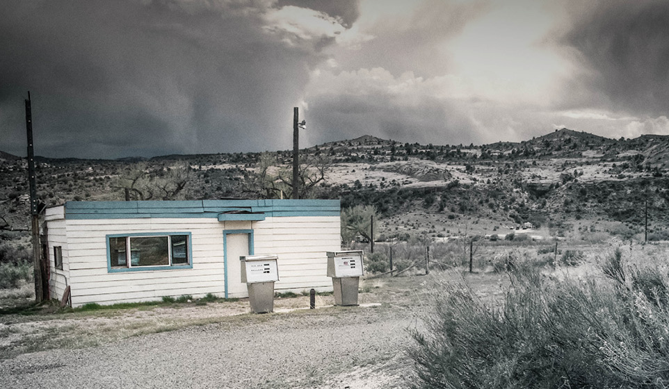 Old Gas Station with cloudy sky in the background