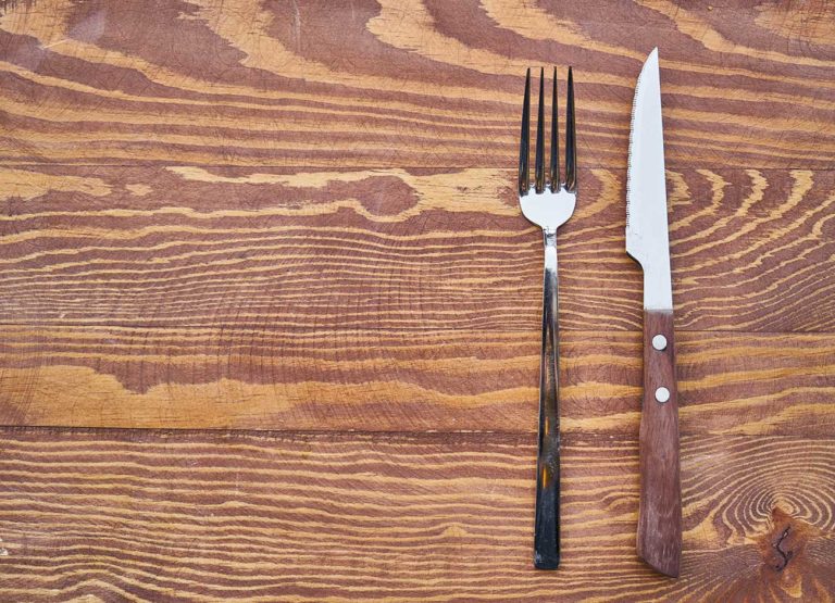 fork and knife on a dinner table
