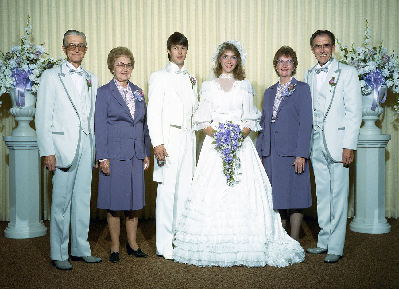 family in wedding attire