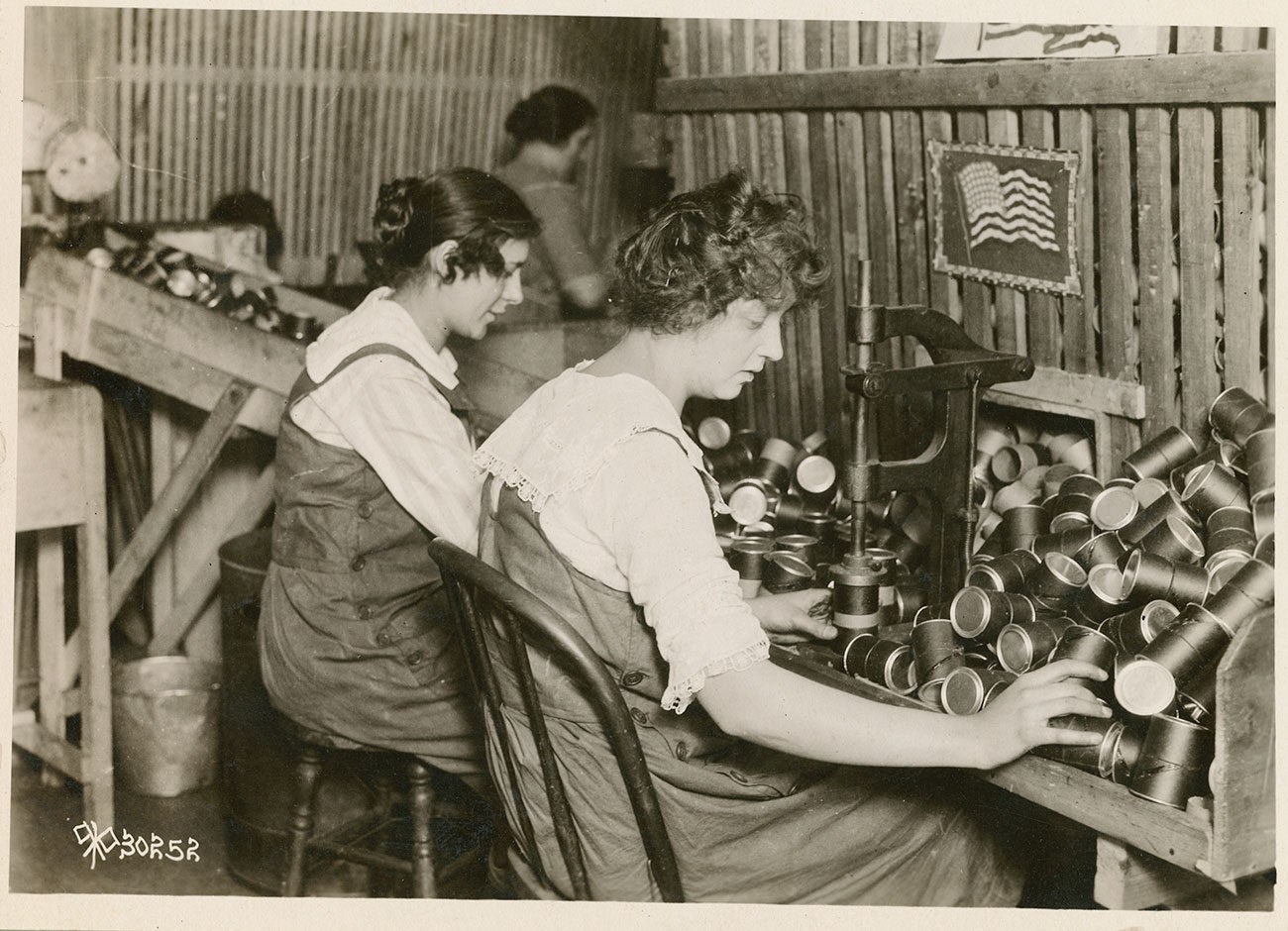 two women assembling mortars during WWI in Hartford, CT.