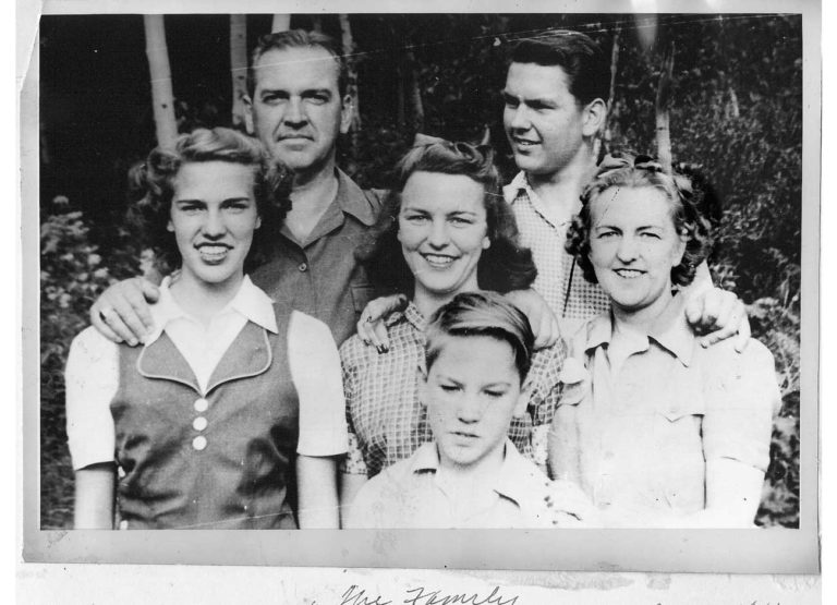 an image of a family of five in black and white taken during August 1941