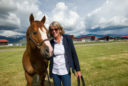 USU President Noelle Cockett walks a horse