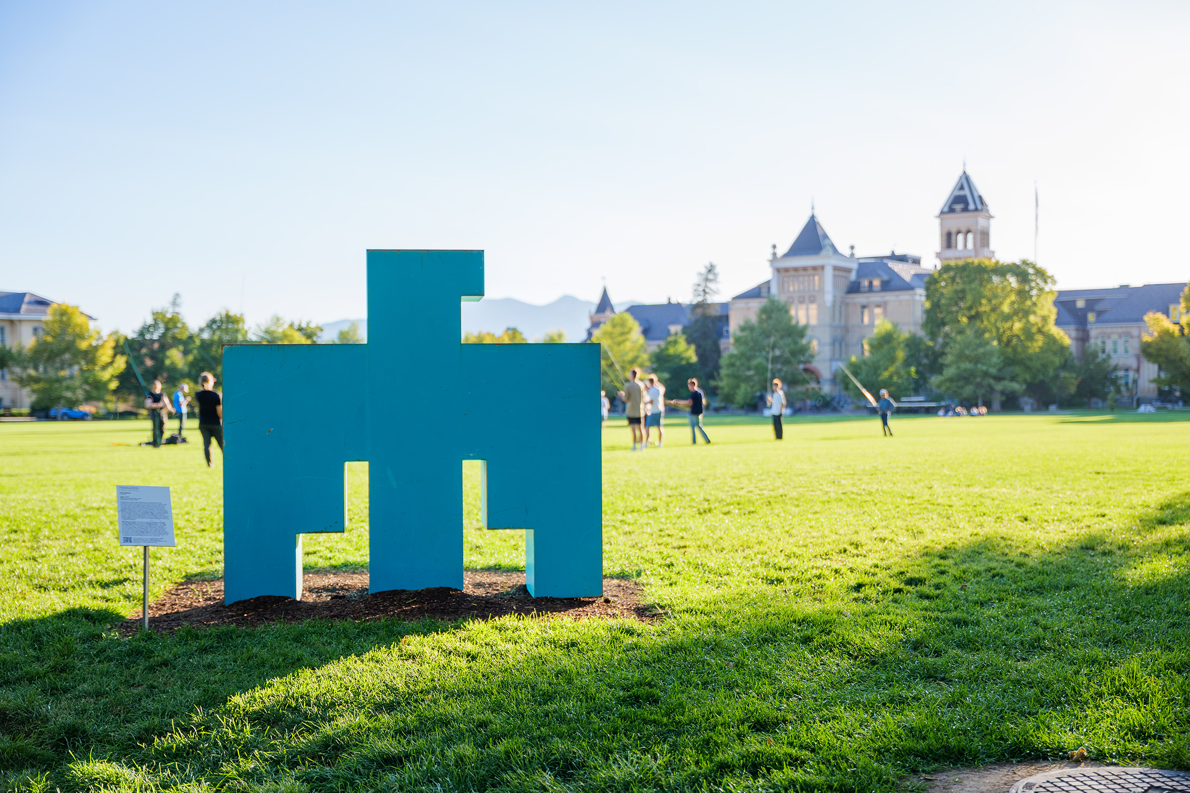 A block style eagle sculpture sits on the Quad at Utah State University.